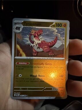 Pokemon Tyrantrum Holo Card - Red and Gold Accents